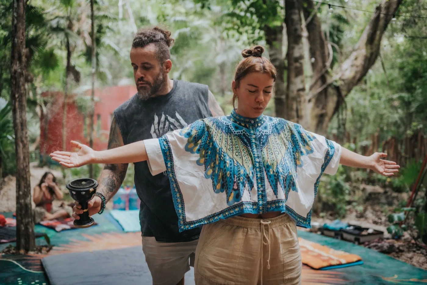 A student being cleansed with copal smoke during a Tiger Soul training
